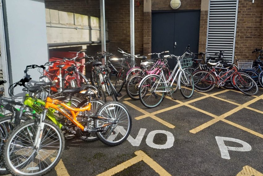 Bikes donated to Sanctuary Wheels piled up at donation point