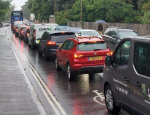 Nose-to-tail traffic in Abingdon Road on a rainy day