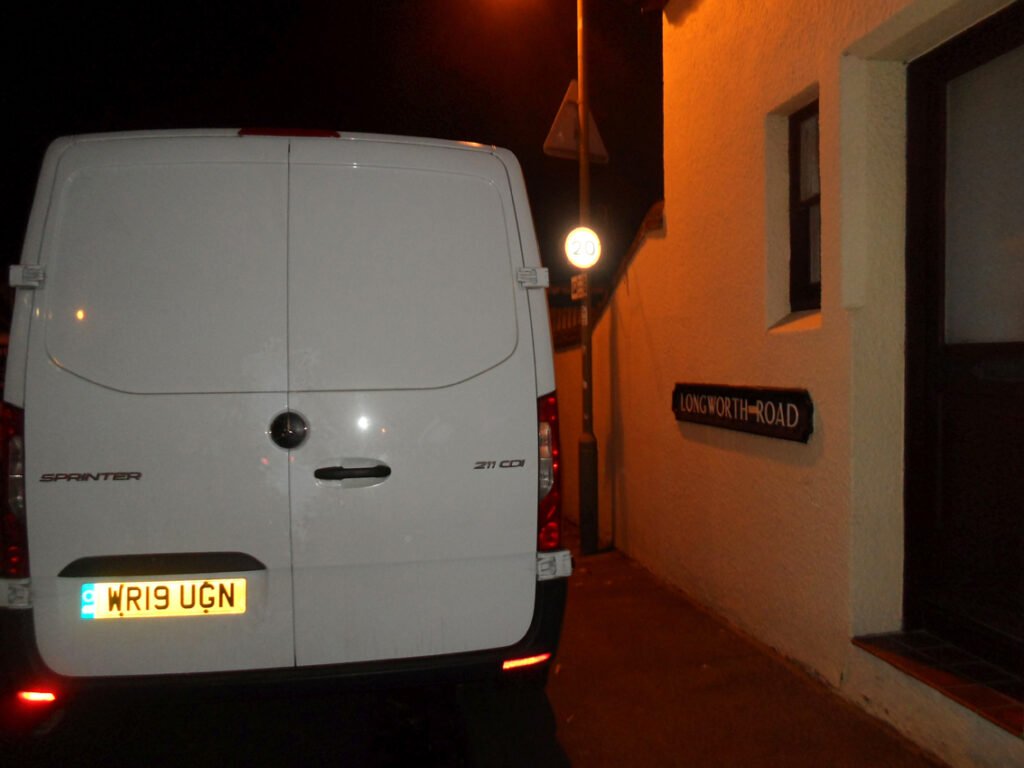 Van parked on pavement blocking route for cyclists and pedestrians