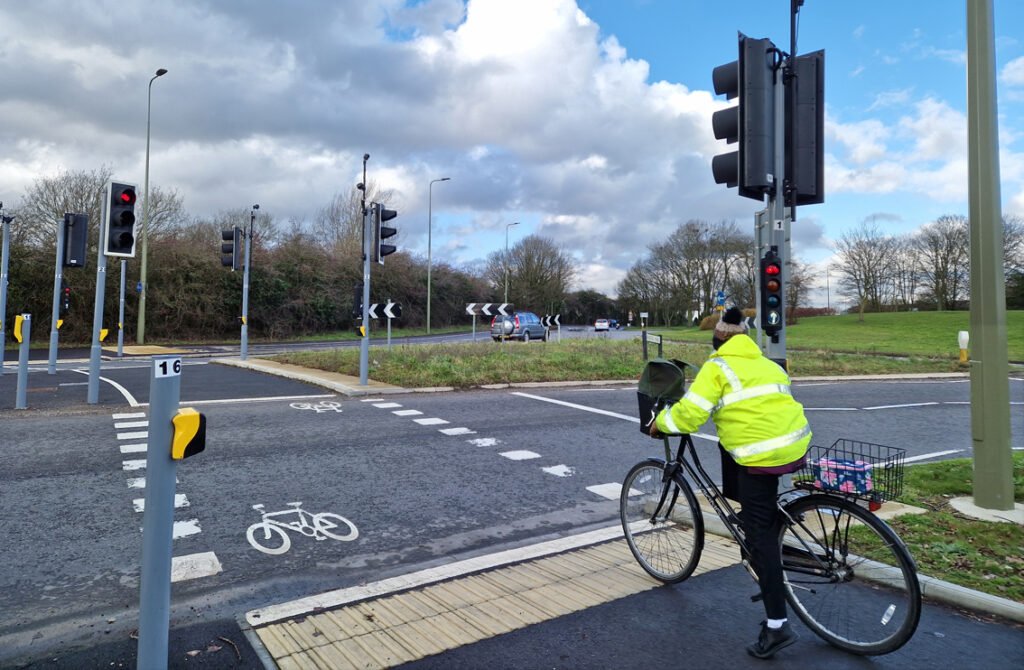 Junction with crossing for bicycles so they can go when light is red for motor traffic